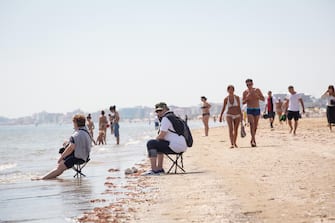 APERTURA BAGNI E STAGIONE ESTIVA IN RIVIERA ROMAGNOLA Bathers on Cesenatico beach on the first day of reopening after coronavirus quarantine in Cesenatico, Italy, 23 May 2020. Italy's most popular beaches, in Sardinia, at Rimini and on the Ligurian Riviera, reopened as Italy is gradually easing lockdown measures implemented to stem the spread of the SARS-CoV-2 coronavirus that causes the COVID-19 disease.
ANSA/Max Cavallari