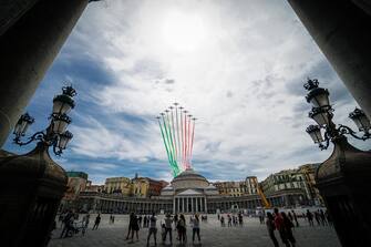 The aerobatic demonstration team 'Frecce Tricolori ' of the Italian Air Force, leaving green, white, and red smoke trails, flies in formation above Plebiscito square in Naples, southern Italy, 28 May 2020. Starting from 25 May 2020, the Frecce Tricolori are performing every day in the skies throughout Italy as part of the 74th anniversary celebrations of the founding of the Italian Republic and to pay homage to the areas most affected by the coronavirus disease (COVID-19) pandemic. The initiative will end on 02 June in Rome on the occasion of the Republic Day (Italian National Day). ANSA/ CESARE ABBATE