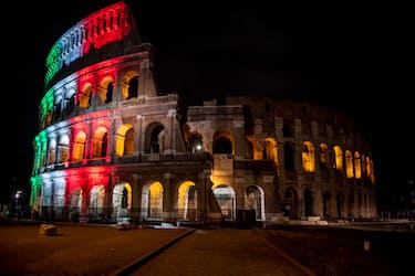 ROME, ITALY - JUNE 01: The Colosseum is illuminated in the colors of the Italian flag to honor the victims of the Coronavirus pandemic, during phase two of the COVID-19 lockdown exit plan on June 1, 2020 in Rome, Italy. The Archaeological Park of the Colosseum is reopening its doors to the public after the lockdown due to the Coronavirus (COVID-19) pandemic in agreement with the ASL Roma 1 which will provide a technical-scientific support for the next two years. (Photo by Antonio Masiello/Getty Images)