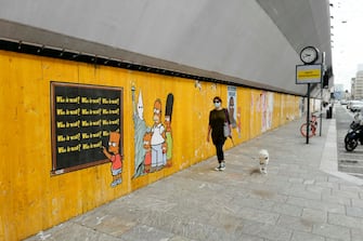 La nuova opera dello street artist Alexandro Palombo 'Just because I am Black' affissa la notte scorsa sui muri della città , Milano, 12 Giugno 2020, ANSA/Andrea Fasani