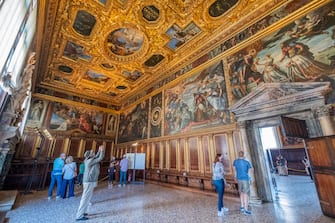 VENICE, ITALY - JUNE 13: Tourists visit the Doge's Palace, which reopened today on June 13, 2020 in Venice, Italy. The whole country is returning to normality after more than two months of a nationwide lockdown meant to curb the spread of Covid-19. (Photo by Stefano Mazzola/Awakening/Getty Images)