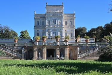 A woman jogs in the park of the Villa Doria Pamphili in Rome on May 4, 2020, as Italy starts to ease its lockdown, during the country's lockdown aimed at curbing the spread of the COVID-19 infection, caused by the novel coronavirus. - Stir-crazy Italians will be free to stroll and visit relatives for the first time in nine weeks on May 4, 2020 as Europe's hardest-hit country eases back the world's longest nationwide coronavirus lockdown. (Photo by ANDREAS SOLARO / AFP) (Photo by ANDREAS SOLARO/AFP via Getty Images)