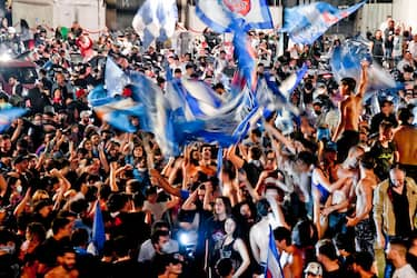 Napoli's supporters celebrate after winning the Italy Cup Final soccer match against Juventus FC, played at the Olimpico stadium of Rome, in the centre of Naples, Italy, 18 June 2020. ANSA/CIRO FUSCO