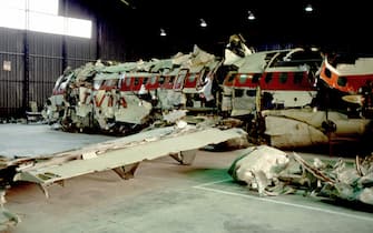 ROME, ITALY - OCTOBER 30: In a hangar of the military airport of Pratica di Mare (Rome) the reassembled of Itavia plane flight 870 which crashed on June 27th, 1980 is seen during a judicial inquiry on October 30, 1992 in Rome, Italy. On June 27th, 1980 the Itavia flight 870 which crashed between the islands of Ponza and Ustica killing all 81 people on board. This event led to many investigations, accusations and misdirections, and continues to be a source of controversy in the country. (Photo by Franco Origlia/Getty Images)