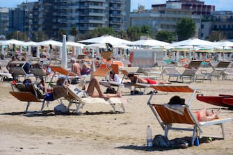 BOLOGNA, ITALY - JUNE 06: People visit Rimini beach on June 02, 2020 in Bologna, Italy. Many Italian businesses have been allowed to reopen, after more than two months of a nationwide lockdown meant to curb the spread of Covid-19. (Photo by Roberto Serra - Iguana Press/Getty Images)