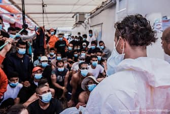 In a photo provided by the press office of Sos Mediterraneè, the Italian medical team consisting of a doctor and a cultural mediator, boarded on Ocean Viking, 4 July 2020. The ship is in international waters with 180 migrants rescued and for days asks to be able to disembark. The ship declared a state of emergency due to the precarious conditions of the rescued people. Ansa / Flavio Gasperini Sos Mediterraneè press office
+++ ATTENZIONE LA FOTO NON PUO? ESSERE PUBBLICATA O RIPRODOTTA SENZA L?AUTORIZZAZIONE DELLA FONTE DI ORIGINE CUI SI RINVIA +++ ++ HO - NO SALES, EDITORIAL USE ONLY ++