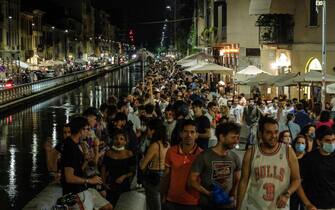 The Milanese nightlife along the Naviglio Grande, in Milan, northern Italy, 12 July 2020.  Nightlife has returned to being popular after restrictions due to the Coronavirus Covid-19 pandemic.
ANSA/MATTEO CORNER