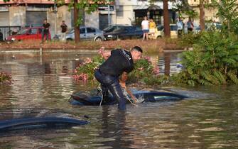 PALERMO, ITALY - JULY 15: Police officers perform search and rescue after a storm flooded part of the town on July 15, 2020 in Palermo, Italy. After a storm, the city was in complete panic with the meteo station registering more than 80 mm of rain within few minutes.  (Photo by Tullio Puglia/Getty Images)