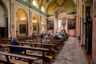 1226766789 CREMONA, ITALY - MAY 24: A half empty church follows the rules of social distancing during the Covid-19 emergency in Spino d'Adda, on May 24, 2020 in Cremona, Italy. Italy is trying an ease of the safety measures of the lockdown due to the Covid-19 pandemic. (Photo by Marco Mantovani/Getty Images)