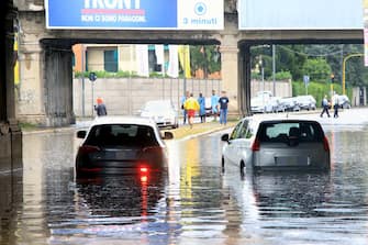 Cars stuck in underpasses in Milan, Italy, following the heavy rains that battered the city in the early morning hours, c?ausing the Seveso and the Lambro rivers to overflow, 24 July 2020. ANSA / PAOLO SALMOIRAGO