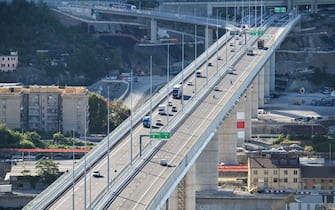 Vehicles drive across the new San Giorgio bridge, following its reopening for traffic, in Genoa, northern Italy on August 5, 2020. - The gleaming new bridge in Genoa built after the deadly collapse of a viaduct opened on August 4, but critics say not enough has been done since the 2018 disaster to overhaul Italy's crumbling infrastructure. (Photo by ANDREAS SOLARO / AFP) (Photo by ANDREAS SOLARO/AFP via Getty Images)