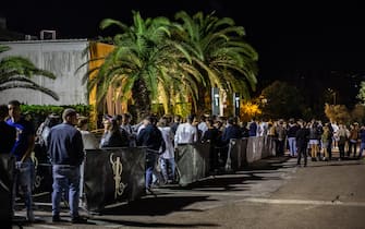 RIMINI, ITALY - JUNE 20: People wait to enter the club at the opening of the summer season for "Villa delle Rose", one of the most famous clubs on the Adriatic Coast on June 20, 2020 in Rimini, Italy. The Villa delle Rose is among the first dance clubs to reopen in the Adriatic Riviera after the Covid-19 pandemic. (Photo by Max Cavallari/Getty Images)