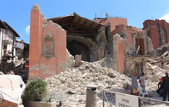 An exterior view of the Church of San Giovanni in Amatrice, near Rieti, central Italy, damaged after the 24 August earthquake. The Civil Protection Department said Friday the latest provisional death toll from Wednesday' earthquake in central Italy is of 267 dead. Of these, 207 died in the Lazio mountain village of Amatrice, 11 in nearby Accumoli and 49 in the village of Arquata del Tronto, in the neighboring Marche region. ANSA/ CARABINIERI - DEPARTMENT FOR PROTECTION OF CULTURAL HERITAGE   +++ ANSA PROVIDES ACCESS TO THIS HANDOUT PHOTO TO BE USED SOLELY TO ILLUSTRATE NEWS REPORTING OR COMMENTARY ON THE FACTS OR EVENTS DEPICTED IN THIS IMAGE; NO ARCHIVING; NO LICENSING +++