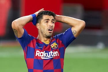 SEVILLE, SPAIN - JUNE 19: Luis Suarez of FC Barcelona reacts during the Liga match between Sevilla FC and FC Barcelona at Estadio Ramon Sanchez Pizjuan on June 19, 2020 in Seville, Spain. (Photo by Mateo Villalba/Quality Sport Images/Getty Images)
