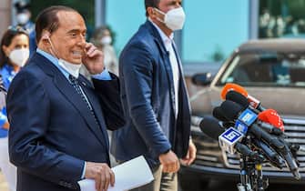 Former Italian prime minister Silvio Berlusconi addresses the media, as he leaves the San Raffaele Hospital in Milan on September 14, 2020 after he tested posititive for coronavirus and was hospitalized since September 3. (Photo by Piero CRUCIATTI / AFP) (Photo by PIERO CRUCIATTI/AFP via Getty Images)