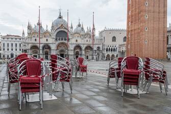 VENICE, ITALY - OCTOBER 03: The "Quadri" bar in St. Mark's Square has tied the tables and chairs to protect them from the arrival of the high tide. on October 03, 2020 in Venice, Italy. For the first time, the Mose flood defence system has come into operation by blocking the entrance of water into the city. (Photo by Stefano Mazzola/Awakening/Getty Images)
