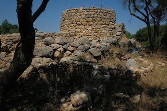 ARZACHENA, ITALY - JULY 26:  The ancient site of Nuraghe La Prigiona stands on July 26, 2018 on the island of Sardinia near Arzachena, Italy. Sardinia is a popular summer tourist destination.  (Photo by Sean Gallup/Getty Images)