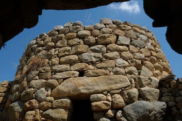 ARZACHENA, ITALY - JULY 26:  The ancient site of Nuraghe La Prigiona stands on July 26, 2018 on the island of Sardinia near Arzachena, Italy. Sardinia is a popular summer tourist destination.  (Photo by Sean Gallup/Getty Images)