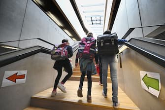 Pupils walk upstairs to go to their classroom at the Europeen school of Strasbourg, eastern France, on September 1, 2020 at the start of the new school year amid the Covid-19 epidemic. - French pupils go back to school on September 1 as schools across Europe open their doors to greet returning pupils this month, nearly six months after the coronavirus outbreak forced them to close and despite rising infection rates across the continent. (Photo by FREDERICK FLORIN / AFP) (Photo by FREDERICK FLORIN/AFP via Getty Images)