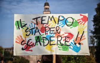 Supporters of school strike movement Fridays For Future demonstrate during the global climate action day in Castello square in Milan, Italy,  09 October 2020  Ansa/Matteo Corner