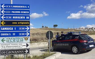 Italian Carabinieri patrol the entrance of Sambuca di Sicilia town, near Agrigento, which was declared red zone, during the Covid-19 emergency, Sambuca di Sicilia, Italy, 17 October 2020. 'We have planned the town s belt services and the block of exits. There are three entry and exit gates and it will be necessary to watch them 24 hours a day. The Local Police agents are very few, the vigilance of the gates will take care by Carabinieri, State Police and Financial Police", said the Prefect of Agrigento.   ANSA / Massimo D'Antoni