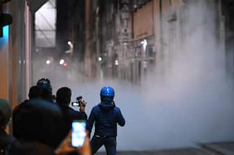 A moment of the clashes happened between Italian Police and protesters in Signoria square during an unauthorized demonstration convened on social networks to protest the government decree in force to face the second wave of the Coronavirus Covid-19 epidemic, Florence, Italy, 30 October 2020. The demonstration is attended by people of various political backgrounds, ranging from the right to antagonism.  ANSA / CLAUDIO GIOVANNINI