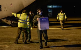 Doses of Pfizer-BioNTech Covid-19 vaccine for distribution in Italy arrive at the Linate airport in Milan, Italy, 26 December 2020. 
ANSA/MATTEO CORNER