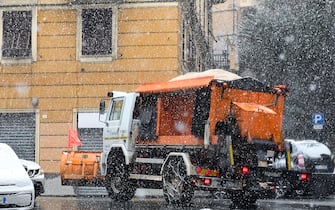 A snowplough at work as city goes through a heavy snowfall, in Genoa, Italy, 28 December 2020ANSA/SIMONE ARVEDA