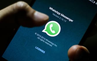 epa06398355 (FILE) - The logo of the messaging application WhatsApp is pictured on a smartphone in Taipei, Taiwan, 07 April 2016 (reissued 19 December 2017). According to reports, the German cartel office on 19 December 2017 found that Facebook has abused its dominant market position. The preliminary findings suggest that Facebook's targeted advertising also uses third-party data collected from the social network's subisidiaries WhatsApp and Instagram.  EPA/RITCHIE B. TONGO *** Local Caption *** 53792142