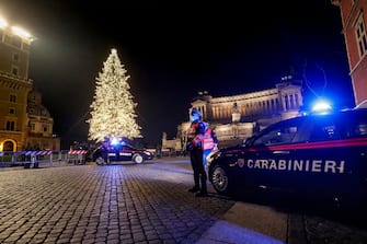 Italian Carabinieri officers check vehicles during a complete lockdown for New Year's Eve celebrations as part of efforts put in place to curb the spread of the coronavirus disease, in Rome, Italy, 1 January  2021, ANSA/GIUSEPPE LAMI
