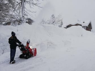 The heavy snowfall in Falcade, in the Belluno Dolomites, where the white blanket exceeds one and a half metres in height, Falcade, near Belluno, Veneto Region, Italy, 02 January 2021.   ANSA/SERENA SCARDANZAN