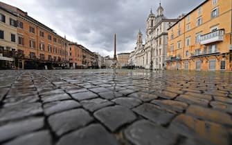 A semi-deserted piazza Navona (Navona square) during pandemic Covid-19 in Rome, Italy, 05 January 2021. Italy is in lockdown over ten days since government restrictions aimed at stopping physical contact during the festive season came into force on 24 December.   ANSA / ETTORE FERRARI