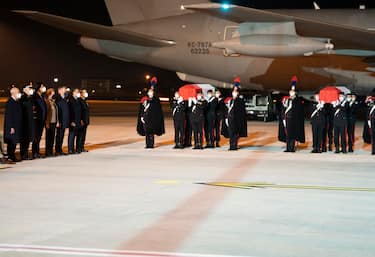 In a handout photo made available by Chigi's Palace press office shows  the Carabinieri carry the coffins with the bodies of the Italian ambassador in the Congo, Luca Attanasio, and the Carabiniere, Vittorio Iacovacci, on arrival at the military airport of Ciampino, near Rome, Italy, 24 February 2021. The two were killed in an attack in Congo a day earlier on the road between Goma and Rutshuru.
ANSA//FILIPPO ATTILI / PALAZZO CHIGI PRESS OFFICE HANDOUT HANDOUT EDITORIAL USE ONLY/NO SALES