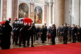 Carabinieri officers carry the coffin with the bodies of ambassador Luca Attanasio and carabiniere Vittorio Iacovacci during the funeral ceremony taking place in the Roman Basilica of Santa Maria degli Angeli in Rome, Italy, 25 February 2021. ANSA/FABIO FRUSTACI

