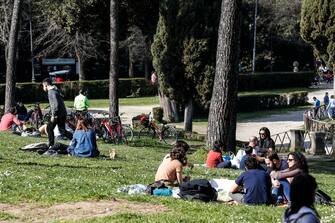 People relax and have fun inside Villa Borghese, in Rome, Italy, 28 February 2021.ANSA/FABIO FRUSTACI