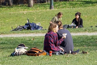 People walking around the Royal Gardens take advantage of the beautiful day and the last weekend before the passage from Monday 15 March of Piedmont to the red zone, Turin, Italy, 13 March 2021 ANSA / JESSICA PASQUALON