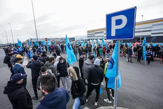 Amazon couriers attend a strike in front of the Brandizzo's Amazon logistics center in Turin, Italy, 22 March 2021.
ANSA/TINO ROMANO