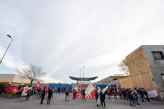 Amazon couriers attend a strike as they block deliveries and vehicles in and out of warehouses,  in front of the  Amazon logistics center HUB at Via Toffetti, in Milan, Italy, 22 March 2021.
ANSA/Andrea Fasani