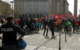 Food delivery bike riders hold a demonstration in Milan, Italy, 26 March 2021. The riders are demanding a real contract, with real protections, concrete guarantees, fairness and respect for their work with adequate remuneration. ANSA/ PAOLO SALMOIRAGO