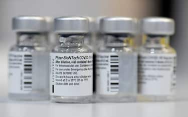 Empty vials of the Pfizer-BioNTech Covid-19 disease vaccine are displayed at the regional corona vaccination centre in Ludwigsburg, southern Germany, on January 22, 2021. - Some 50 regional vaccination centers in the federal state of Baden-Wuerttemberg opened in the morning of January 22, but due to a lack of vaccine, only some 80 persons per day can currently receive vaccination. (Photo by THOMAS KIENZLE / AFP) (Photo by THOMAS KIENZLE/AFP via Getty Images)