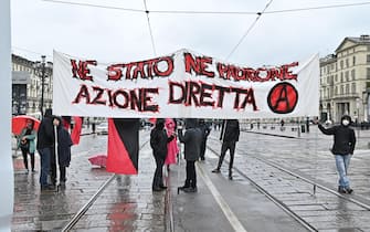 Manifestazione centri sociali e No Tav in piazza Vittorio in occasione della festa del primo maggio, Torino, 1 maggio 2021 ANSA/ ALESSANDRO DI MARCO
