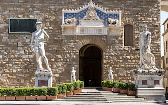1232175607 FLORENCE, ITALY - 2021/03/31: The entrance to Palazzo Vecchio with the deserted Piazza della Signoria due to lockdown because of covid-19 red zone. (Photo by Federico Neri/Pacific Press/LightRocket via Getty Images)