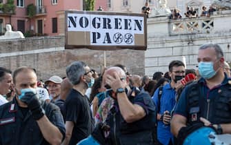 Protesters during the demonstration against the "Green Pass" at Del Popolo's square in the centre of Rome, Italy, 31 July 2021.
ANSA/MASSIMO PERCOSSI