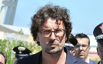 ponte morandi genova crollo ricostruzione Italian Transport and Infrastructure Minister Danilo Toninelli during a visit at the site of the highway-bridge-collapse disaster in Genoa, Italy, 15 August 2018. . ANSA/ ALESSANDRO DI MARCO