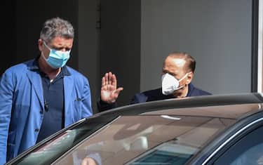 Forza Italia leader Silvio Berlusconi, flanked by Marta Fascina, leaves the San Raffaele hospital in Milan, Italy, 27 August 2021. The centre-right Forza Italia (FI) leader, who turns 85 next month, was taken to Milan's San Raffaele, where his personal physician operates. Berlusconi has been struggling with long COVID after suffering a bout of the virus last year
ANSA/MATTEO CORNER