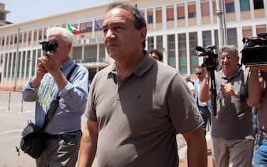 Domenico 'Mimmo' Lucano (R), suspended Mayor of Riace, leaves after an hearing at the Locri court, Italy, 11 June 2019.
ANSA/Marco Costantino