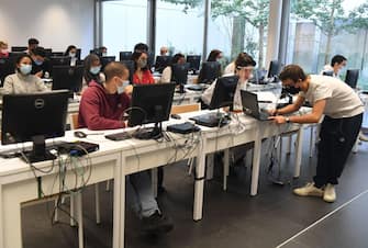 Students attend a course at the Orsay Mathematic Institute unit at the Paris-Saclay University in Saclay, on the outskirts of Paris, on September 17, 2021. (Photo by ALAIN JOCARD / AFP) (Photo by ALAIN JOCARD/AFP via Getty Images)