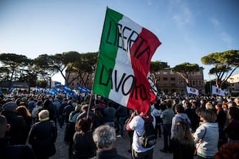 People take part in the No Green Pass demonstration at the Circo Massimo in Rome, Italy, 15 October 2021. ANSA/ANGELO CARCONI