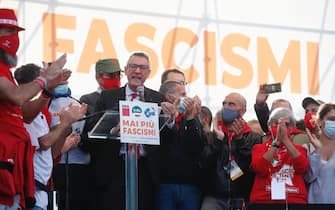 Italian General Secretary of CGIL, Maurizio Landini, on the podium during an anti-fascist rallyat San Giovanni square  in Rome, Italy, 16 October 2021, a week after a demonstration against the so-called Green Pass degenerated into an assault on the CGIL trade union building, led by the neo-fascist Forza Nuova party. ANSAANGELO CARCONI