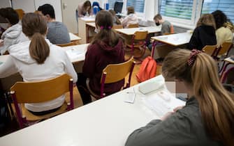 Students self-test with a rapid COVID-19 antigen self-test kit in a primary school in Kranj.
Starting on Wednesday, primary and secondary school children in Slovenia are required to self-test in school three times a week as the country faces a severe outbreak of COVID-19.